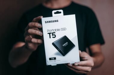 Person holding a Samsung portable SSD external drive