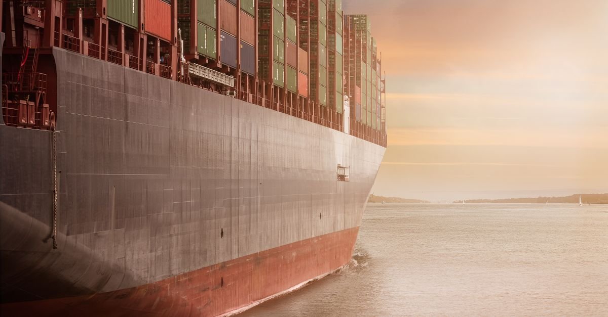 Massive cargo ship loaded with containers