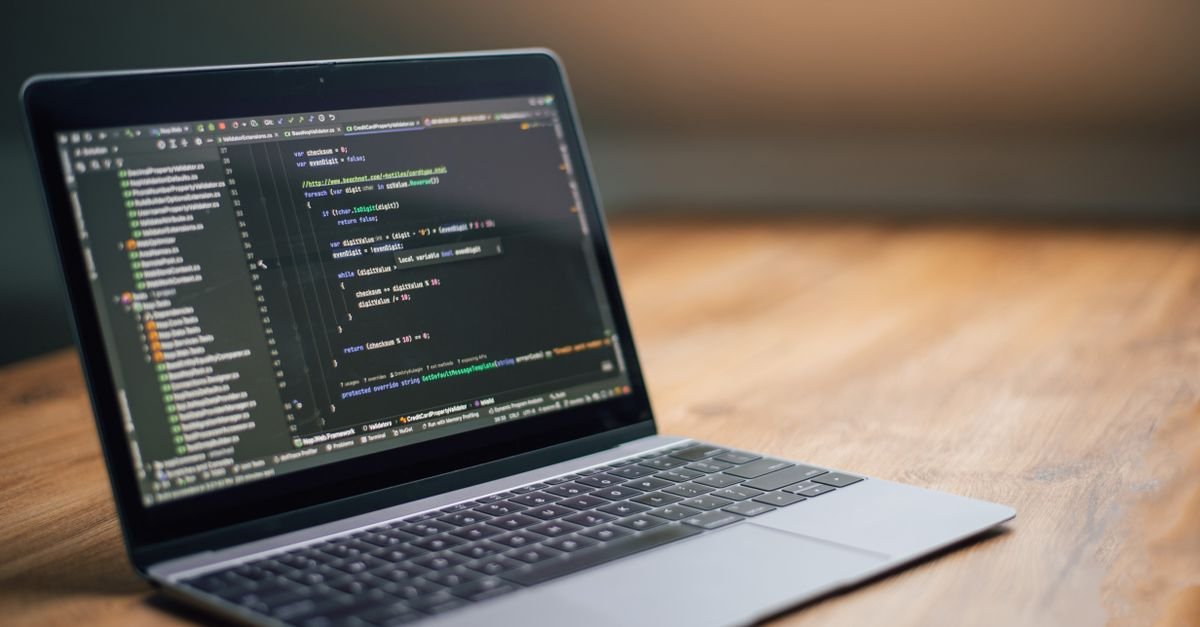 Developer laptop with code in an editor