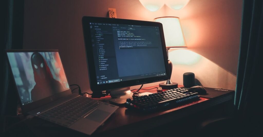 Developer working with code at a desk workstation