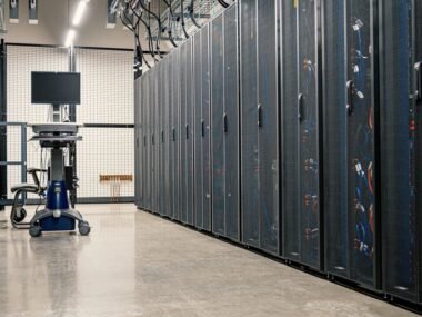 A long corridor of server racks in a data center