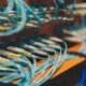 Blue network cables wired into switching equipment