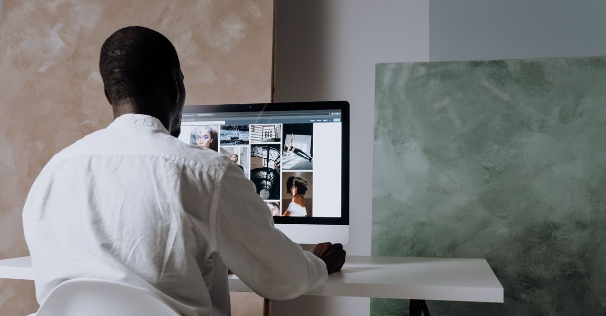 A person building a website at a workstation