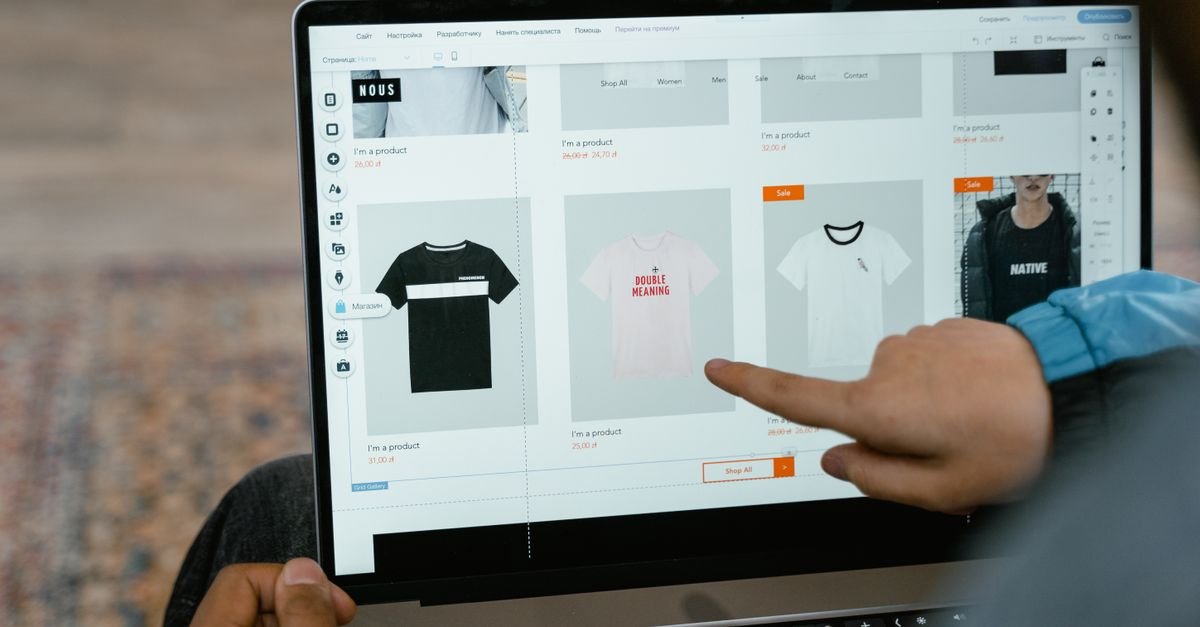 Person testing a website layout on a screen