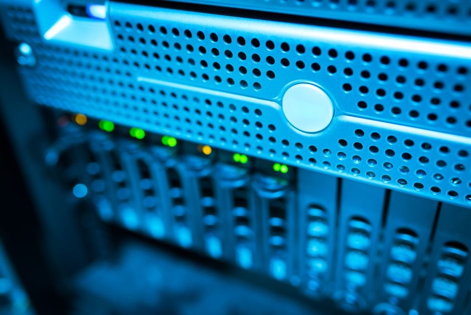 Close-up of web hosting server hardware and drive LEDs