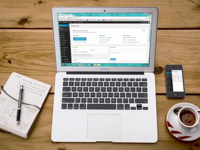 WordPress admin dashboard open on a laptop