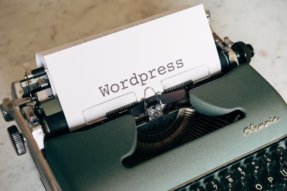 The word WordPress typed on paper in a typewriter