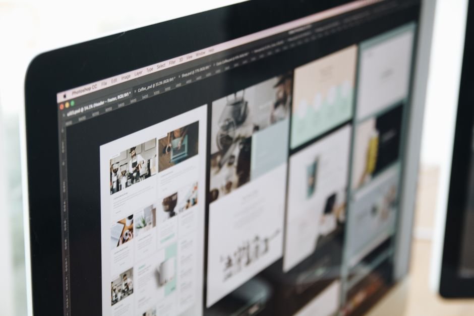 Website design layouts on a desktop screen