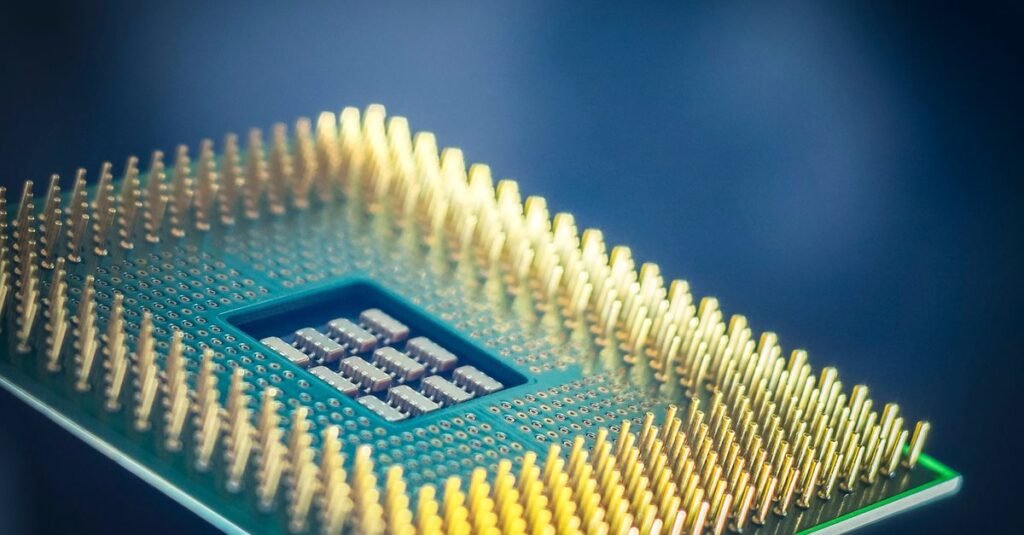 Close-up of a computer processor's gold pins