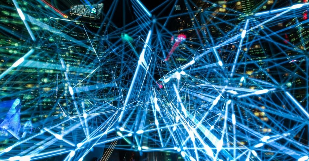Blue light trails representing network connections over a city