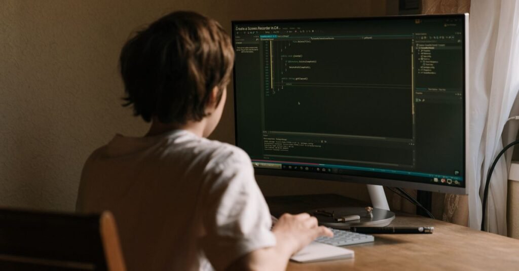 A developer focused on a code screen