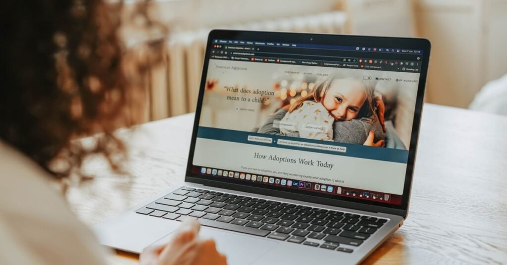 A person viewing a website on a laptop