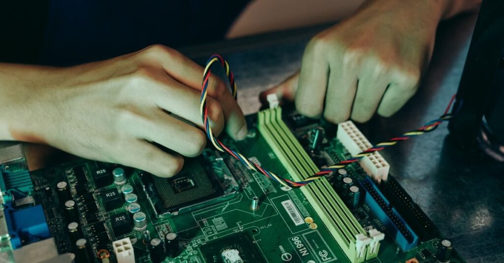 Hands working on server hardware