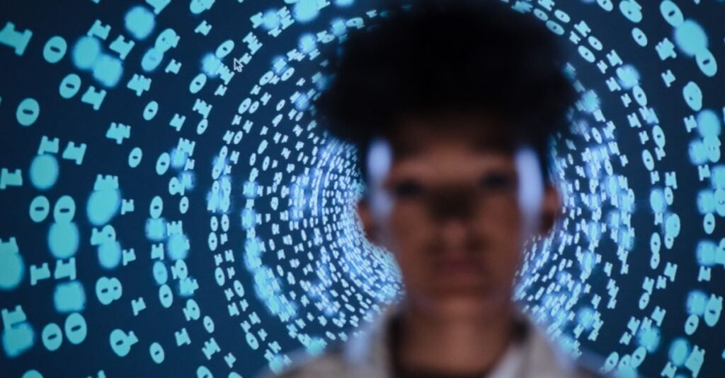 Person surrounded by streams of digital data